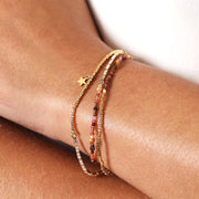 Brown Bead & Star Charm Multi Layer Bracelet in Gold