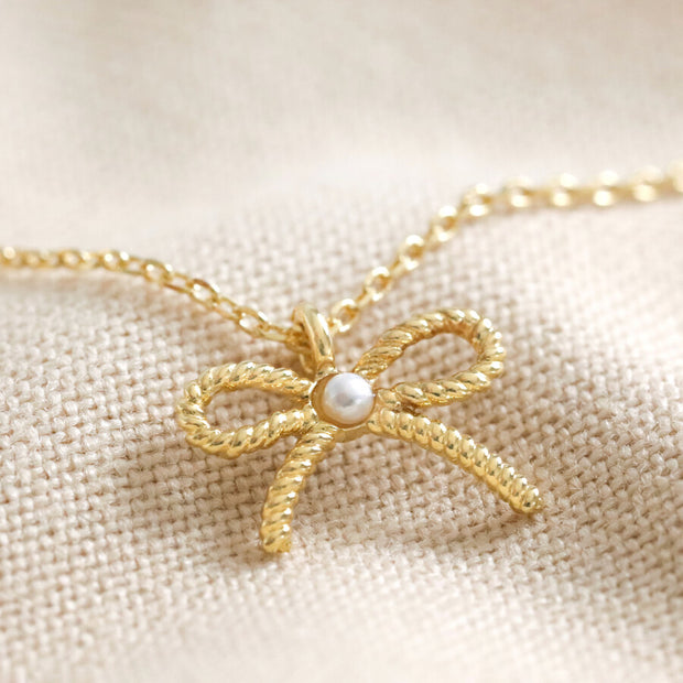 Tiny Pearl Bow Necklace in Silver or Gold