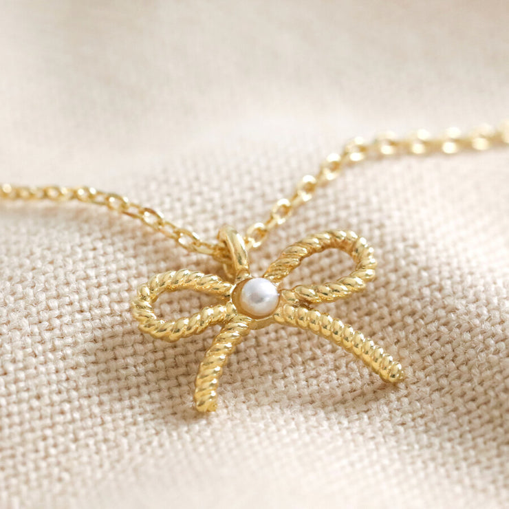 Tiny Pearl Bow Necklace in Silver or Gold