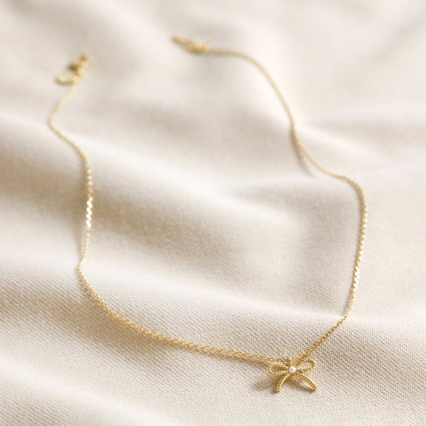 Tiny Pearl Bow Necklace in Silver or Gold
