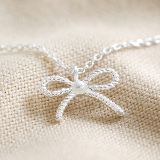 Tiny Pearl Bow Necklace in Silver or Gold